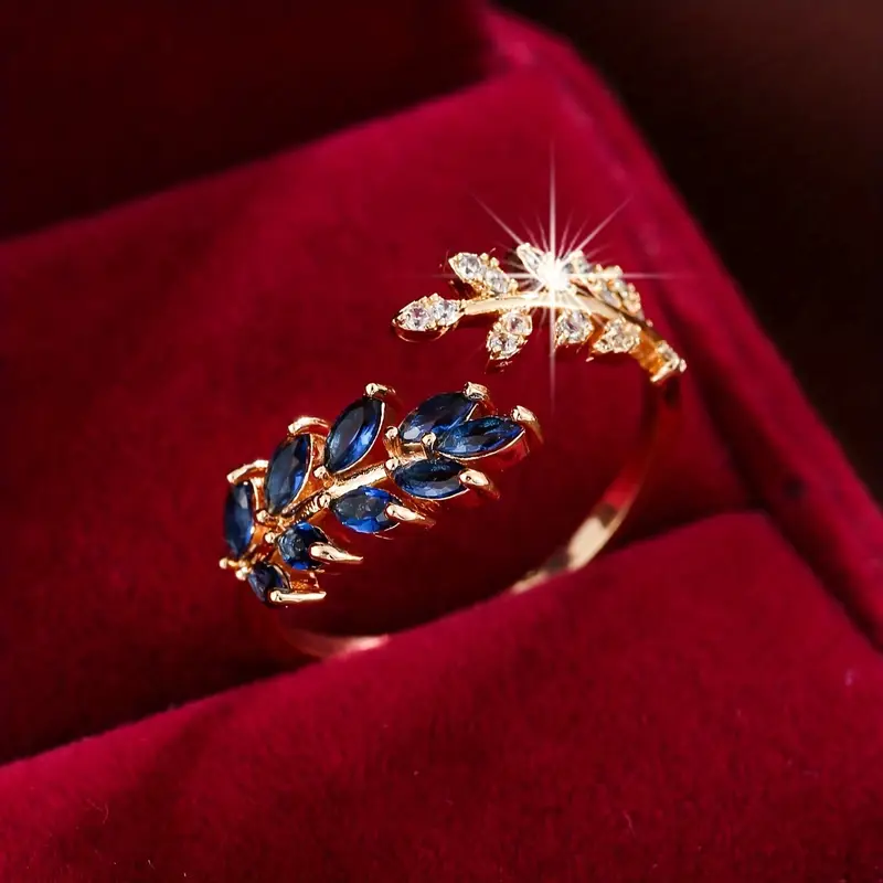 Bague en or avec zirconium bleu ouvert
