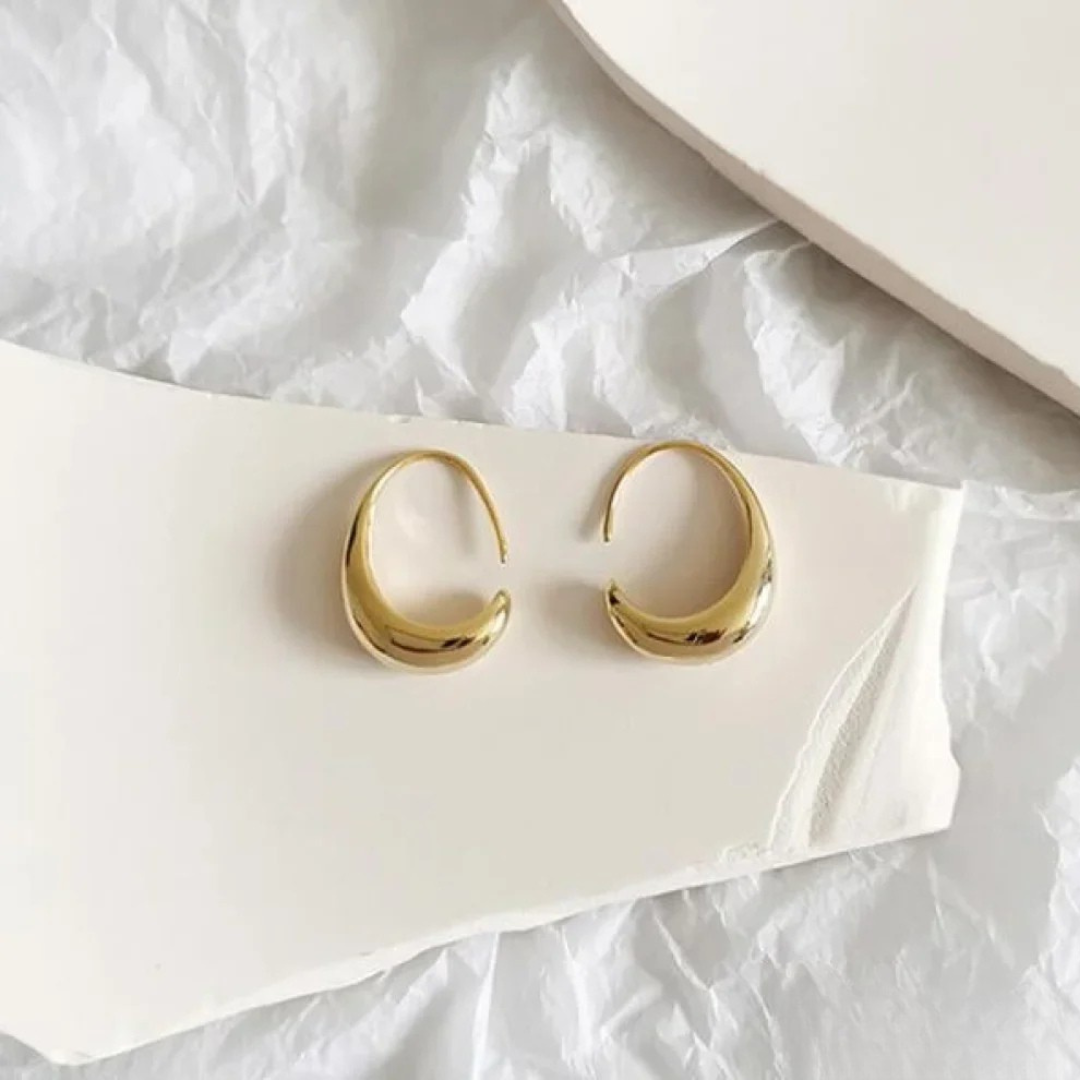 Luxuriöse Ohrringe aus Gold und Silber
