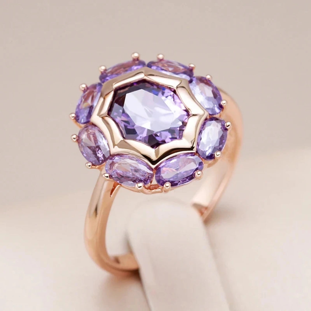 Bague en or avec cristal violet arrondi