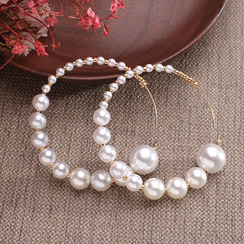 Boucles d'oreilles en argent massif faites à la main avec des perles d'eau douce naturelles